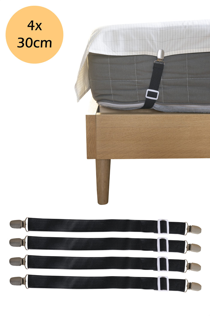 Set van vier Earthle lakenspanners van 30 cm, met een aardingslaken strak om een matras
