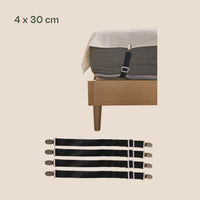 Set van vier Earthle lakenspanners van 30 cm, met een aardingslaken strak om een matras